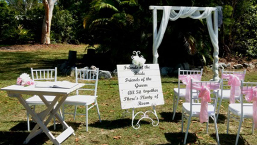 white wooden wedding arbor package