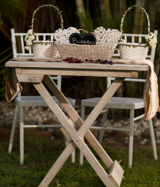 a table with flower baskets and bubbles